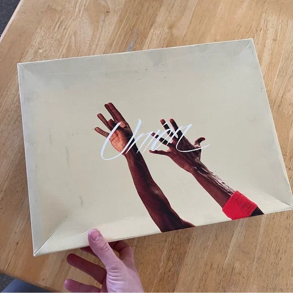 Air Jordan 4 Retro Low-Top in Black with Blue and Red Accents - Picture 5 of 11